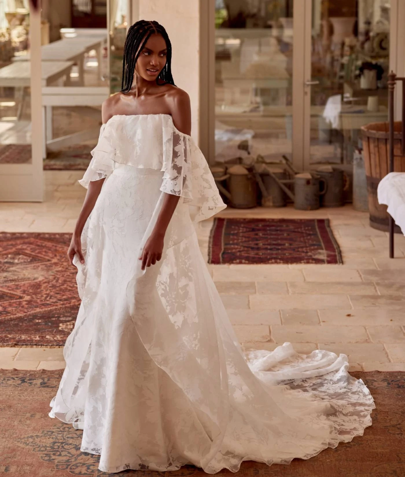 Model wearing white Lillian West 2025 bridal dress