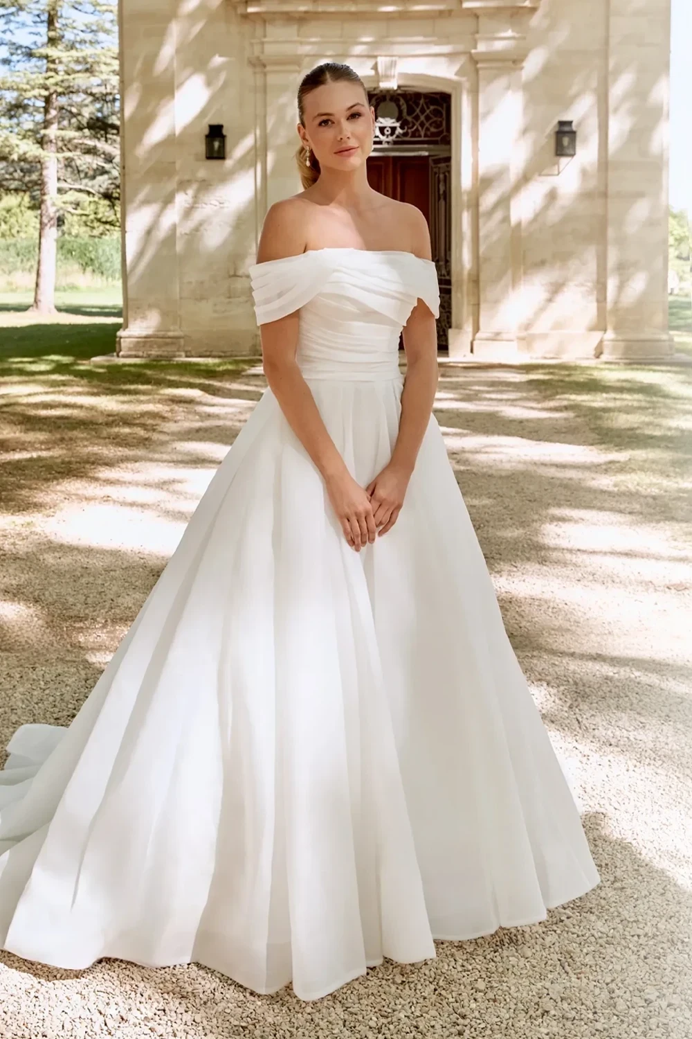 Model wearing white Sincerity Bridal gown