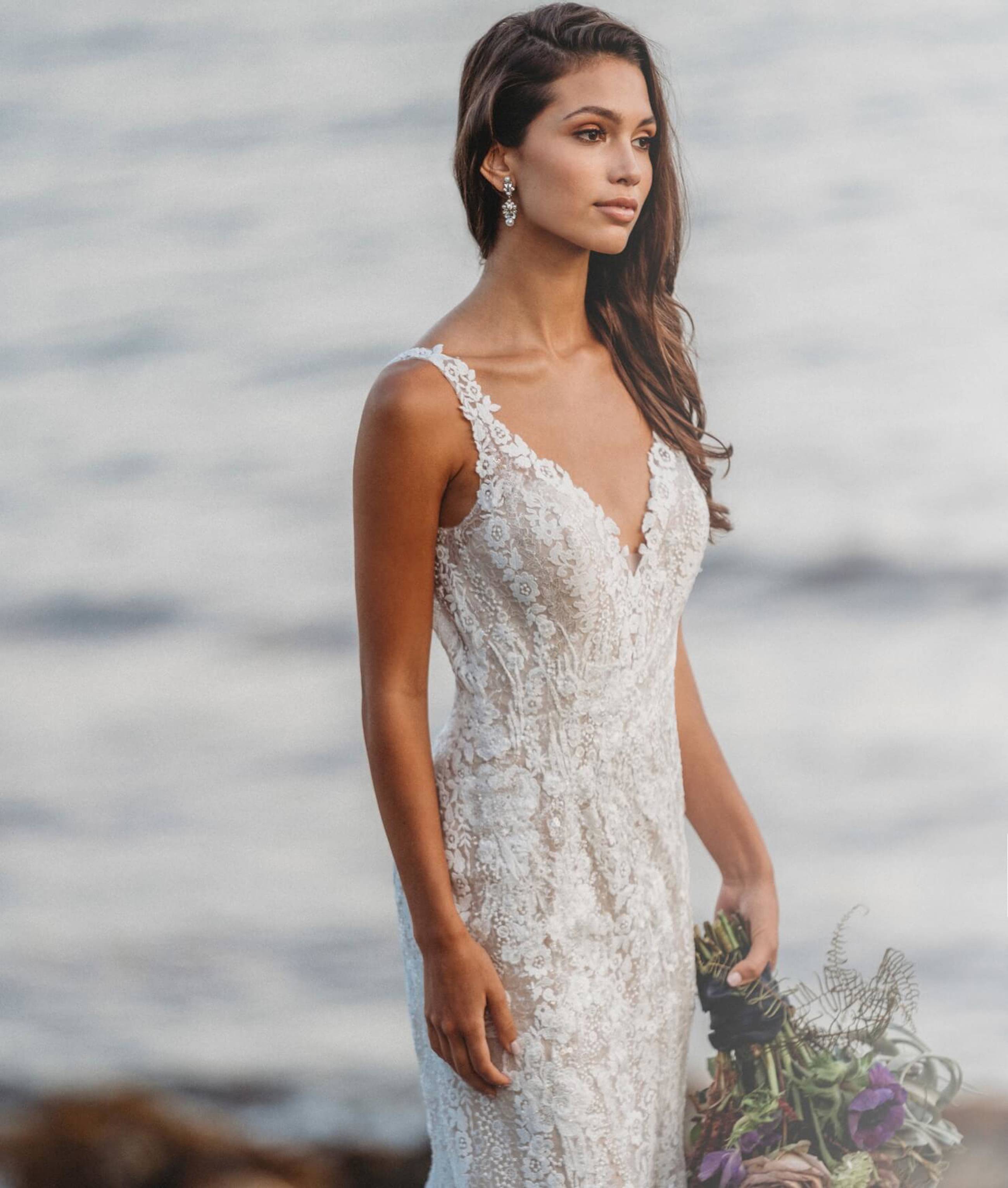 Model wearing white Allure Bridalwear dress
