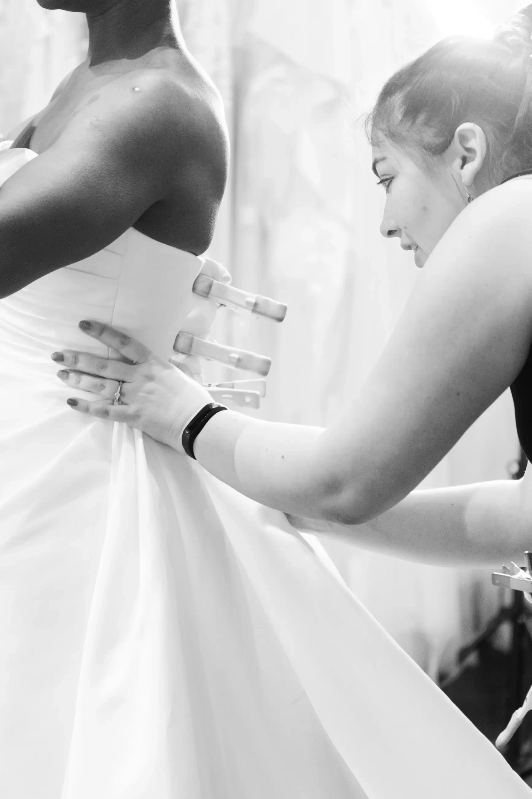 Bridal Stylist working on a Bridal Gown