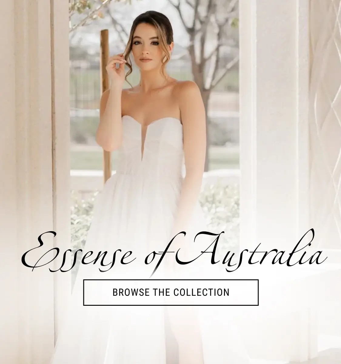 A girl wearing a Essense of Australia bridal gown