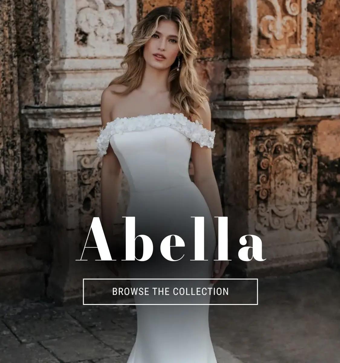 A girl wearing an Abella bridal gown